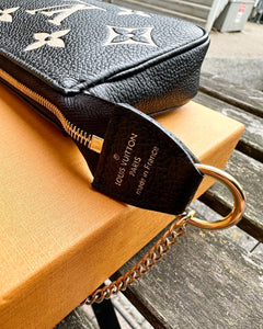 LOUIS VUITTON Bicolour Monogram Empreinte Leather Mini Pochette
