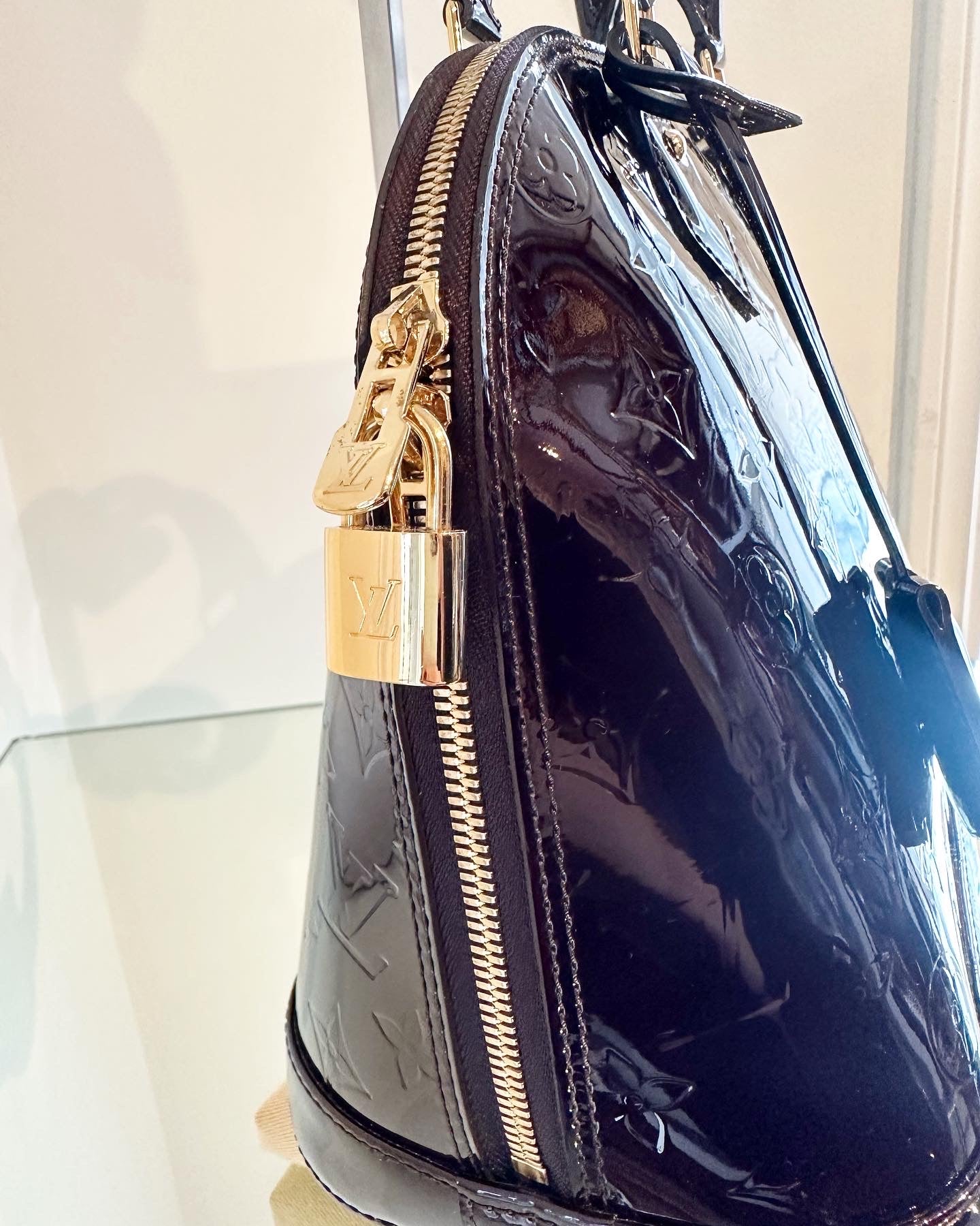 LOUIS VUITTON Amarante Vernis Alma PM Bag – Susannah Designer Consignment