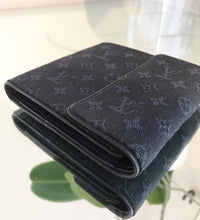Load image into Gallery viewer, LOUIS VUITTON Sepia Navy Monogram Mini Lin Trifold Wallet
