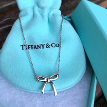 Load image into Gallery viewer, TIFFANY &amp; CO. Sterling Silver Mini Bow Pendant Necklace

